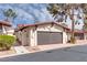 Charming single story home featuring a large two-car garage and well-kept landscaping at 2532 Whippoorwill Ln, Las Vegas, NV 89121