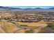 An aerial shot showing the home's proximity to the golf course and scenic landscape at 257 Pinnacle Ct, Mesquite, NV 89027