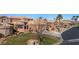 A beautiful shot of the home's street view featuring desert landscaping and tile roofs at 257 Pinnacle Ct, Mesquite, NV 89027