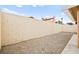 Gravel backyard providing a low-maintenance outdoor area enclosed by a block wall at 2793 Sandyfalls Way, Las Vegas, NV 89142