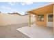 This gravel-covered backyard has a covered patio at 2793 Sandyfalls Way, Las Vegas, NV 89142