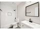 Bathroom featuring modern fixtures, white subway tile, and tub at 2793 Sandyfalls Way, Las Vegas, NV 89142