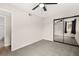 Bedroom featuring carpet, a ceiling fan, and a mirrored closet at 2793 Sandyfalls Way, Las Vegas, NV 89142