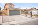 Charming home featuring a two-car garage and low-maintenance landscaping at 2793 Sandyfalls Way, Las Vegas, NV 89142