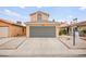 Charming home featuring a two-car garage and low-maintenance landscaping at 2793 Sandyfalls Way, Las Vegas, NV 89142