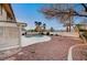 Backyard with a sparkling pool, patio, and ample space for outdoor activities at 2916 W Oakey Blvd, Las Vegas, NV 89102