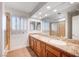 Dual sink bathroom with granite counters, natural light and updated fixtures at 2916 W Oakey Blvd, Las Vegas, NV 89102