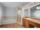 Bathroom featuring a shower/tub combo, vanity with granite countertop, and tile accents at 2916 W Oakey Blvd, Las Vegas, NV 89102