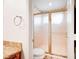 Bathroom shower with gold trim and a frosted door at 2916 W Oakey Blvd, Las Vegas, NV 89102