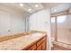 Bathroom with granite countertops, sink, and shower at 2916 W Oakey Blvd, Las Vegas, NV 89102