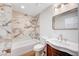 Bathroom featuring a modern design, a vanity with a sink, and tiled walls in shower at 2916 W Oakey Blvd, Las Vegas, NV 89102