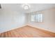 A bright bedroom featuring wooden flooring and natural light from window at 2916 W Oakey Blvd, Las Vegas, NV 89102