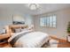 Bedroom with a large bed, stylish lighting, and window with blinds at 2916 W Oakey Blvd, Las Vegas, NV 89102