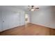Well-lit bedroom with wood-look flooring, a ceiling fan, and closet at 2916 W Oakey Blvd, Las Vegas, NV 89102