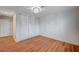 A clean bedroom features closet, white walls, wood floor and modern ceiling light at 2916 W Oakey Blvd, Las Vegas, NV 89102