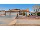 Charming single-Gathering home featuring a three-car garage and manicured landscaping at 2916 W Oakey Blvd, Las Vegas, NV 89102