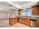 Kitchen features granite countertops, stainless steel appliances, and wood cabinets at 2916 W Oakey Blvd, Las Vegas, NV 89102