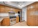 Kitchen with granite countertops, stainless steel appliances and wood cabinets at 2916 W Oakey Blvd, Las Vegas, NV 89102