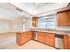 Functional kitchen featuring granite countertops, stainless steel appliances, and a sink at 2916 W Oakey Blvd, Las Vegas, NV 89102