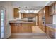 Updated kitchen features granite countertops, stainless steel appliances, and ample cabinet space at 2916 W Oakey Blvd, Las Vegas, NV 89102
