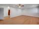 Large living room with wood floors, recessed lighting, and a view into other rooms at 2916 W Oakey Blvd, Las Vegas, NV 89102