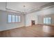 Spacious living room with vaulted ceilings, fireplace, and large windows with wood shutters at 2916 W Oakey Blvd, Las Vegas, NV 89102