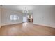 Bright, empty living room with hardwood floors, recessed lighting, and view of kitchen at 2916 W Oakey Blvd, Las Vegas, NV 89102