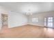 Open-concept living space with wood flooring and a view leading to a well appointed bathroom at 2916 W Oakey Blvd, Las Vegas, NV 89102