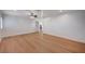 Bright living room with light wood floors, ceiling fan, and neutral paint at 2916 W Oakey Blvd, Las Vegas, NV 89102
