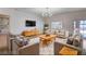 Spacious living room featuring modern decor, comfortable seating, and a large flat-screen TV at 2916 W Oakey Blvd, Las Vegas, NV 89102