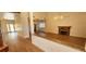 Spacious living room with hardwood floors, fireplace, chandelier, and modern design at 2916 W Oakey Blvd, Las Vegas, NV 89102