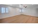 Inviting living room featuring light wood floors and plantation shutters at 2916 W Oakey Blvd, Las Vegas, NV 89102