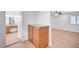 Spacious main bedroom boasts a dresser and flows into a bright bathroom area at 2916 W Oakey Blvd, Las Vegas, NV 89102