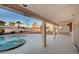 Covered patio and backyard featuring a sparkling pool and jacuzzi at 2916 W Oakey Blvd, Las Vegas, NV 89102