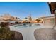 Backyard featuring a refreshing pool, patio, and mature landscaping at 2916 W Oakey Blvd, Las Vegas, NV 89102