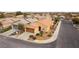 Single-story home with tile roof, complemented by xeriscape landscaping, on corner lot at 2970 Strathspey Ct, Henderson, NV 89044