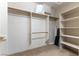 Walk-in closet with ample shelving and hanging space for organized storage at 2970 Strathspey Ct, Henderson, NV 89044