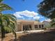 Backyard featuring a covered patio and desert landscaping at 3117 Brightridge Dr, Las Vegas, NV 89134
