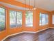 Cozy breakfast nook featuring bright walls, wood-look floors, and ample natural light at 3117 Brightridge Dr, Las Vegas, NV 89134