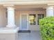 Inviting front entrance with decorative pillars and a well-maintained garden at 3117 Brightridge Dr, Las Vegas, NV 89134