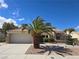 Attractive one-story home boasts a well-manicured yard and a classic tile roof at 3117 Brightridge Dr, Las Vegas, NV 89134
