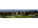 Scenic golf course view with lush green fairways and the Las Vegas skyline in the background at 3117 Brightridge Dr, Las Vegas, NV 89134