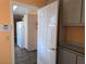 Bright kitchen area showcases new cabinets, laminate flooring, and stainless steel appliances at 3117 Brightridge Dr, Las Vegas, NV 89134