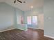 Inviting living room featuring stylish wood flooring, neutral color palette, and plenty of natural light at 3117 Brightridge Dr, Las Vegas, NV 89134