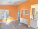 Spacious living room featuring wood floors, built-in cabinets, and open layout at 3117 Brightridge Dr, Las Vegas, NV 89134