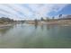 Scenic pond view with water fountains, landscaping, and nearby residences at 3117 Brightridge Dr, Las Vegas, NV 89134