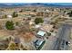 Scenic aerial view displays the layout, back yard features, and its surroundings at 3140 Unicorn Ave, Pahrump, NV 89048