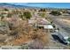 An aerial perspective highlights the roof, back yard, and position within the community at 3140 Unicorn Ave, Pahrump, NV 89048