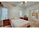 Comfortable bedroom features natural lighting, writing on the wall, and closet at 3140 Unicorn Ave, Pahrump, NV 89048