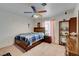 Bedroom with a ceiling fan and window at 3140 Unicorn Ave, Pahrump, NV 89048